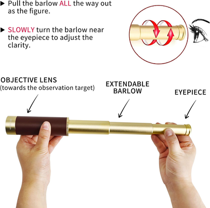 Monocular telescope held in hand showing compact size