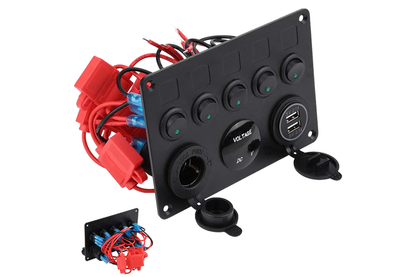 Close-up of illuminated rocker switches on panel