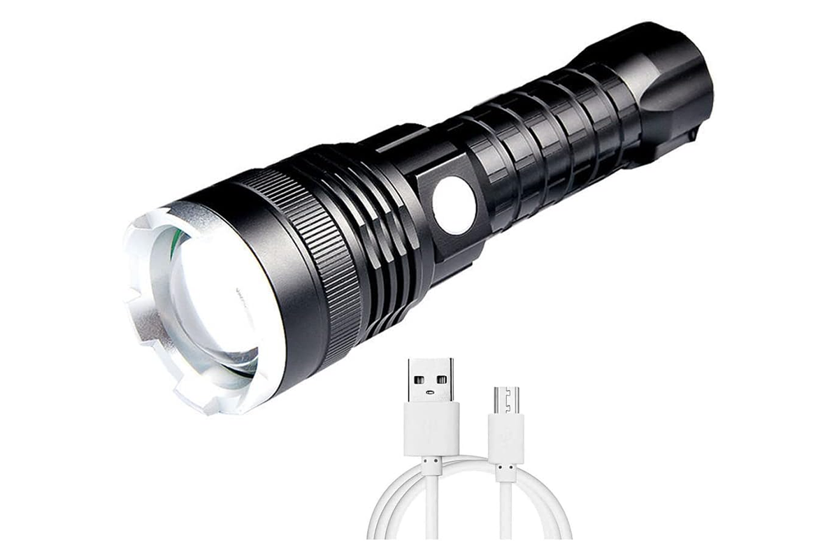 Close-up of rechargeable torch LED glowing power button