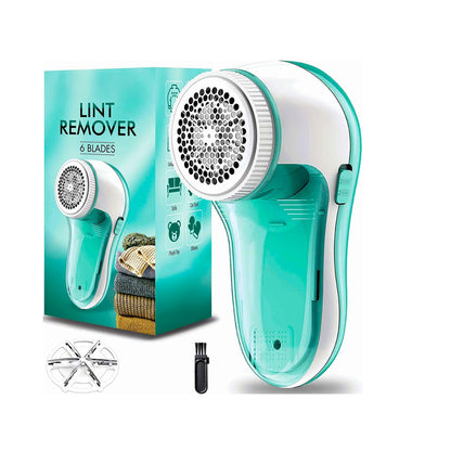 Electric lint remover showing large shaving head in white and green