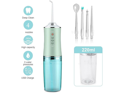 Portable water flosser cordless green in use for braces cleaning