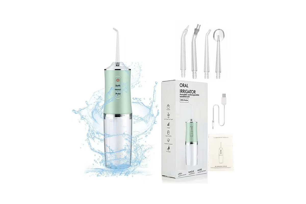 Close up of portable water flosser cordless green 360 degree rotatable nozzle