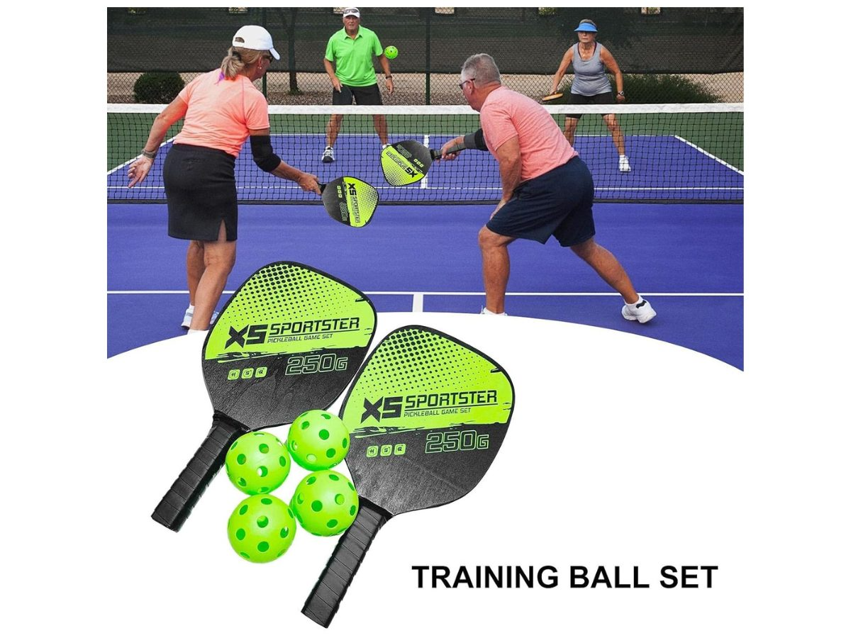 Pickleball set displayed with paddles crossed and balls in front