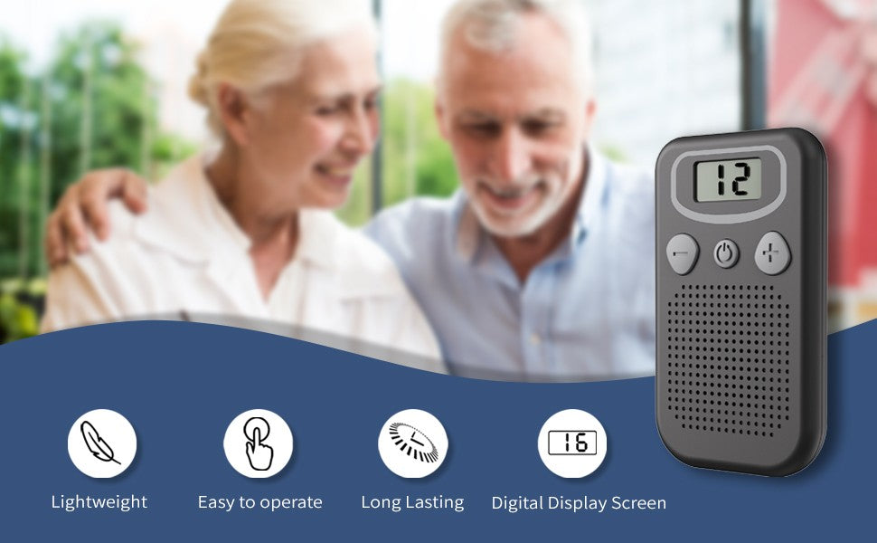 Ear hearing aids device in black colour resting on a flat surface