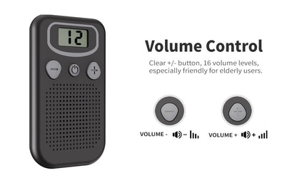 Ear hearing aids device in black colour resting on a flat surface
