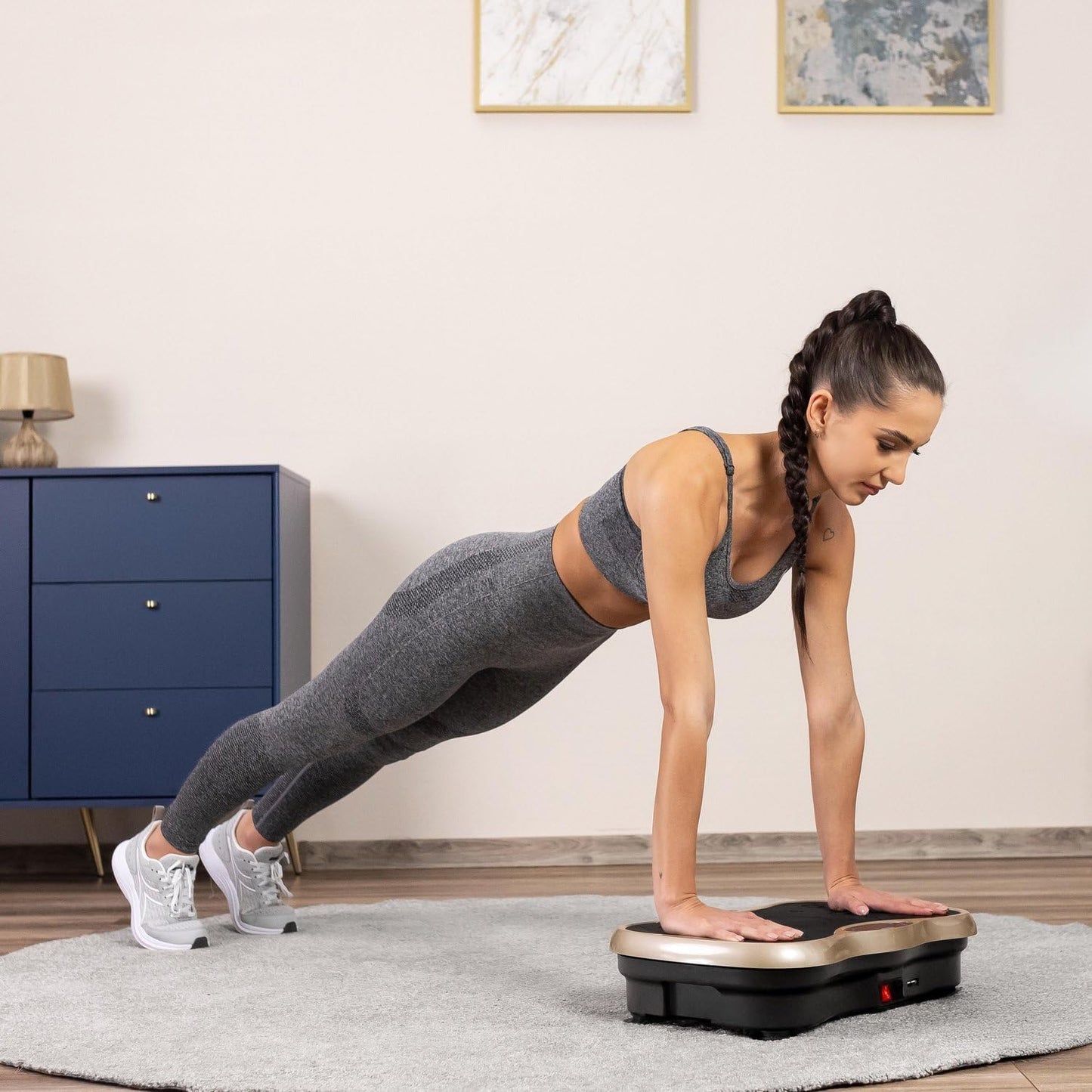 Vibration plate exercise machine with yoga straps attached