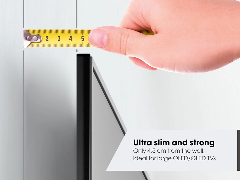 TV wall mount holding a 55 inch TV securely on wall