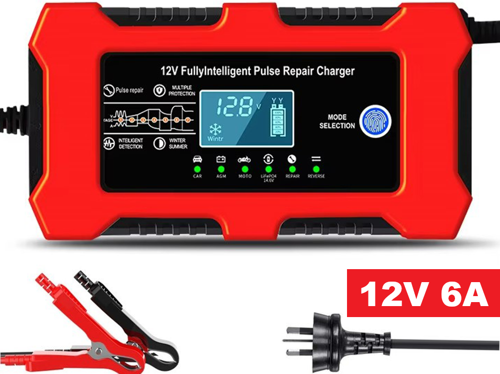 Close-up of crocodile clips on car battery charger 12V 6A