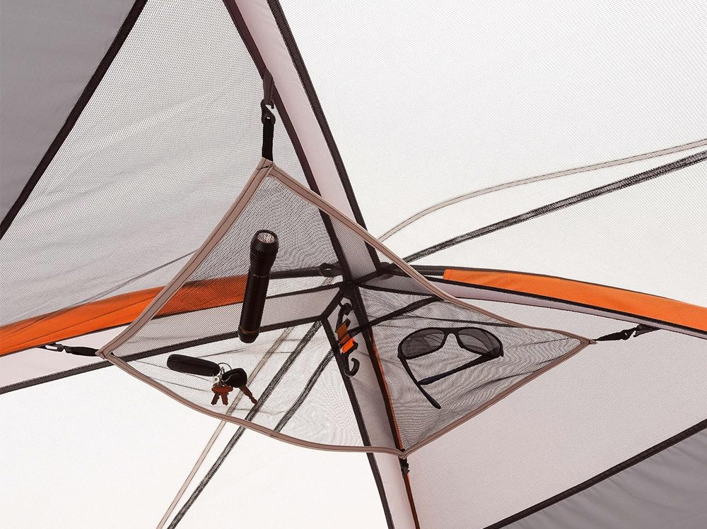 Camping tent family tent set up at beach showing UV protection
