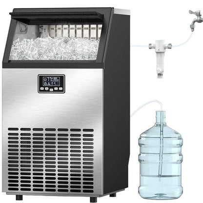 Ice cube maker installed in a home bar setting with stainless steel finish