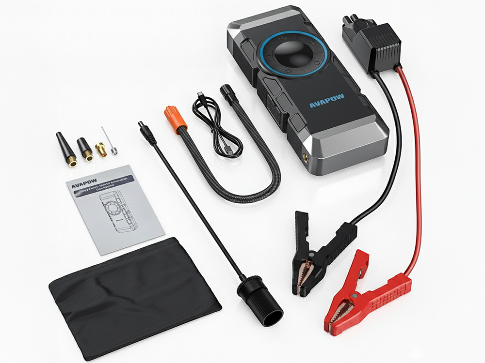 Car jump starter with air compressor used outdoors at night with LED light