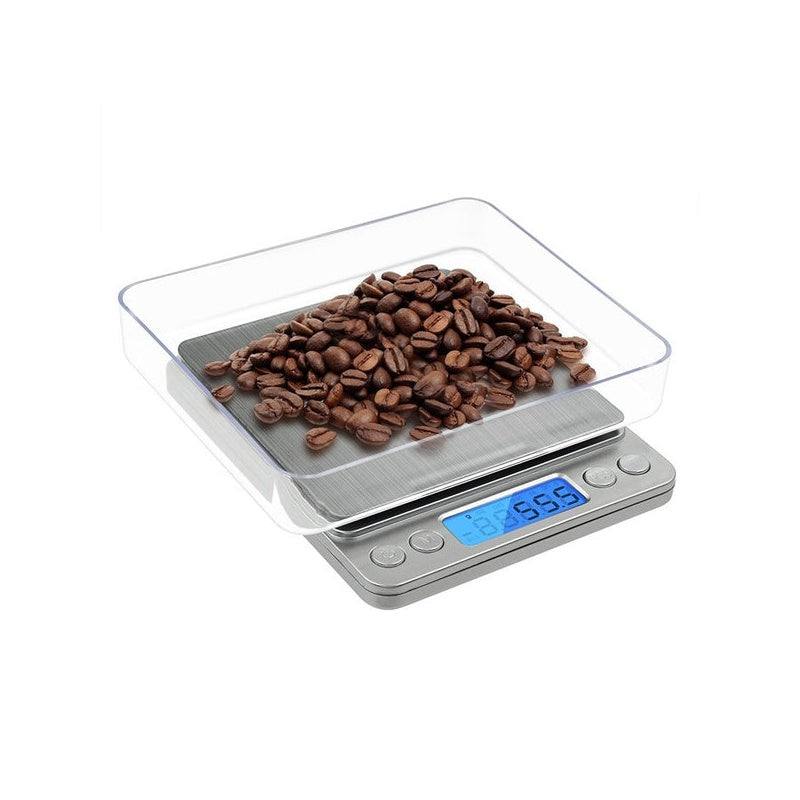 Digital kitchen scale showing bright blue backlit display