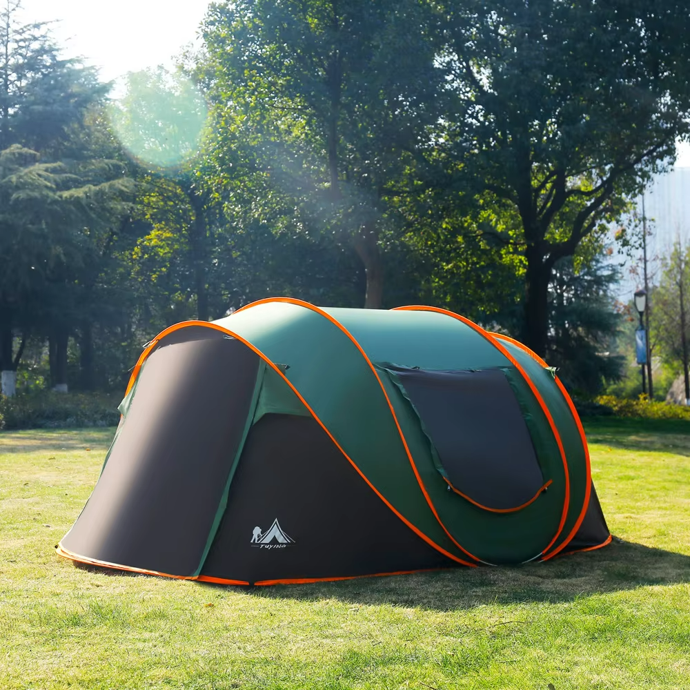 Camping tent 4-6 person set up on grass for family camping