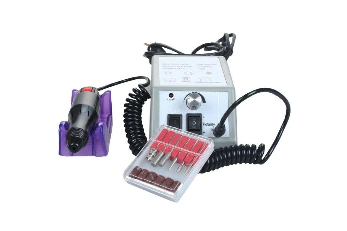 Close up of electric nail care tool handle with heat sink design