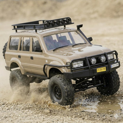 RC Rock Crawler Truck – 1:16 Scale 4WD Off-Road RC SUV with LED Lights, Snorkel, Roof Rack and 2 Rechargeable Batteries