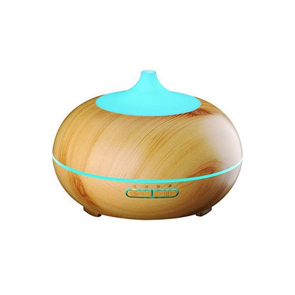 Aromatherapy diffuser humidifier showing wood grain finish on top