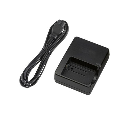 Battery charger for Canon LP-E5 showing front view with LED indicator