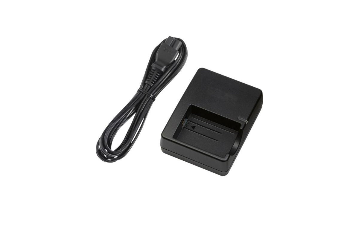 Side angle of Canon LP-E5 battery charger with NZ power cord attached