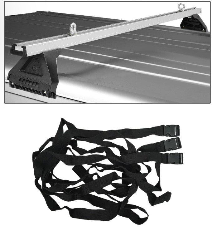 Tie-down straps attached to car roof rack cross bar for load security