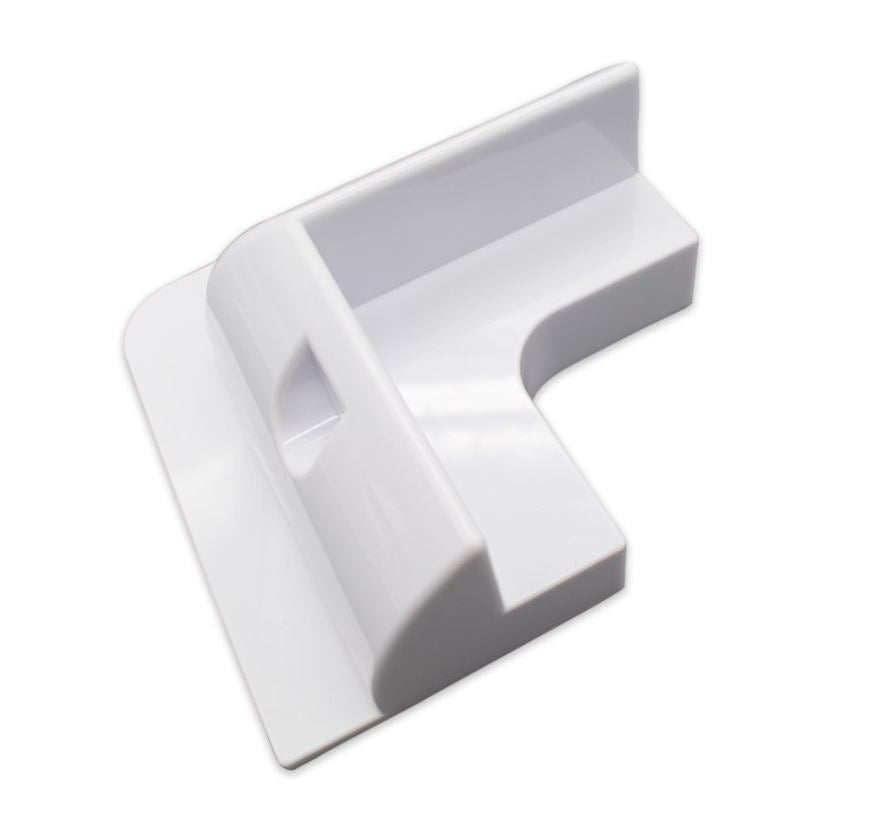 Solar panel mounting kit acting as wind deflector on caravan