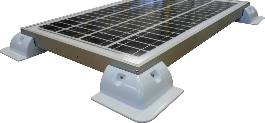 White solar panel mounting brackets supporting aluminium frame