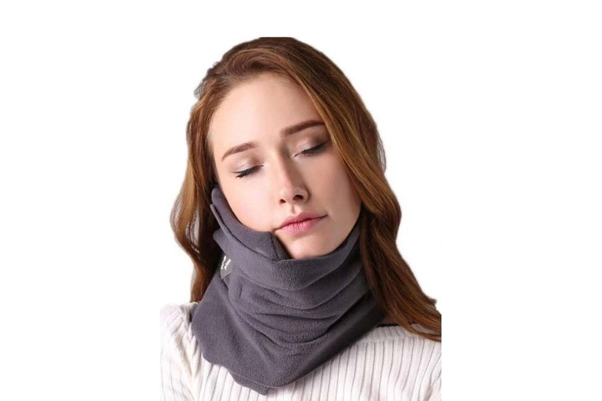Side angle of travel pillow showing ergonomic neck support