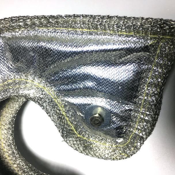 Turbo Beanie Heatshield T4 covering turbine housing on T4 turbo