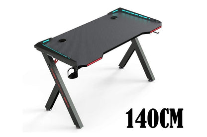 Side view of gaming desk table showing sturdy metal legs