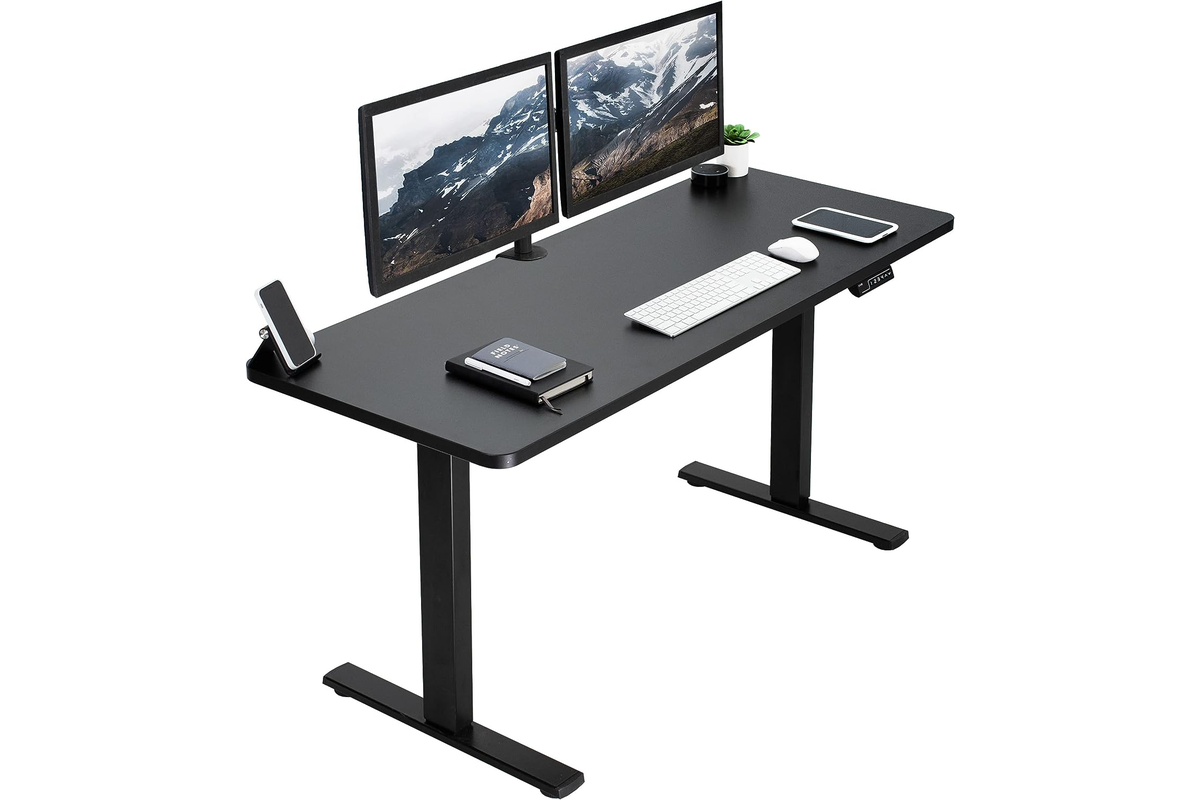 Black tabletop on height adjustable desk 120 by 60 centimetres