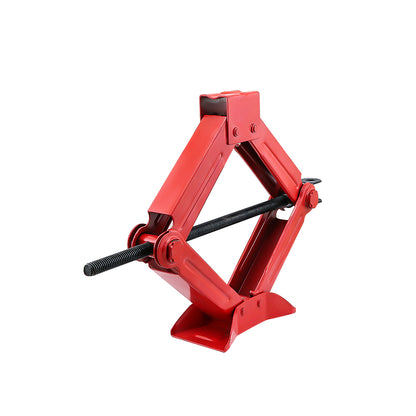 Heavy duty scissors jack placed on flat ground for stability