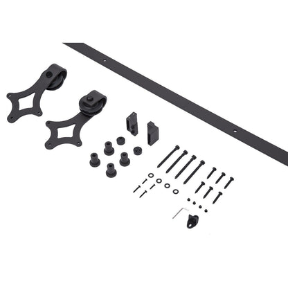 Door stopper included in barn door hardware kit