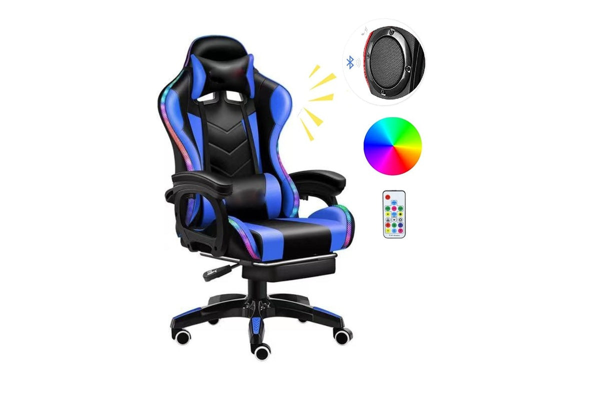 Side view of gaming chair with footrest and adjustable headrest