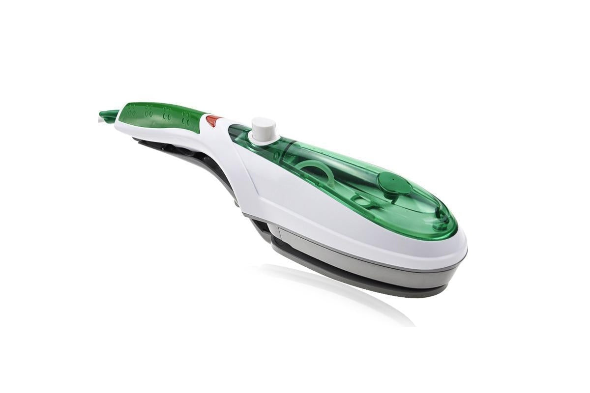 Close up of garment steamer steam nozzle and fluff brush