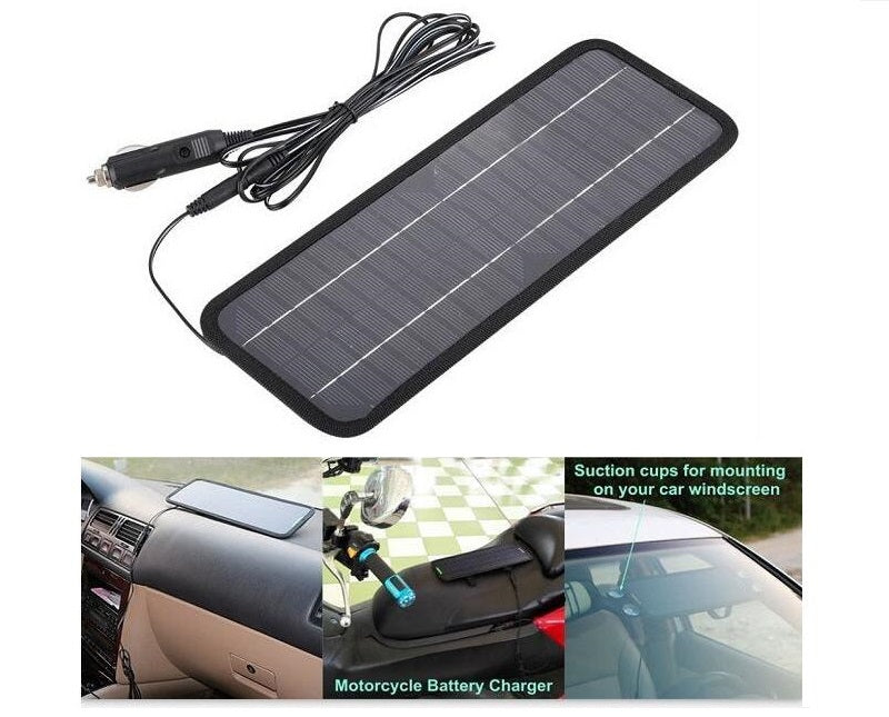 Solar car battery charger 12V displaying LED indicator light on panel