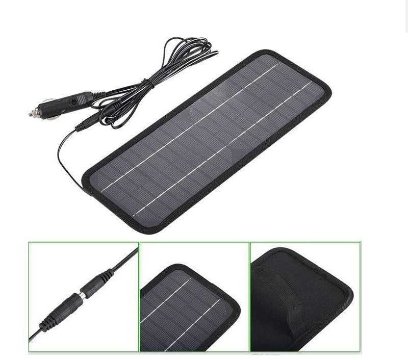 Back view of solar car battery charger 12V showing cable and plug