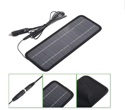 Back view of solar car battery charger 12V showing cable and plug