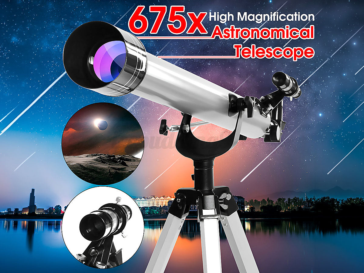 Astronomical telescope mounted on adjustable tripod in outdoor setting