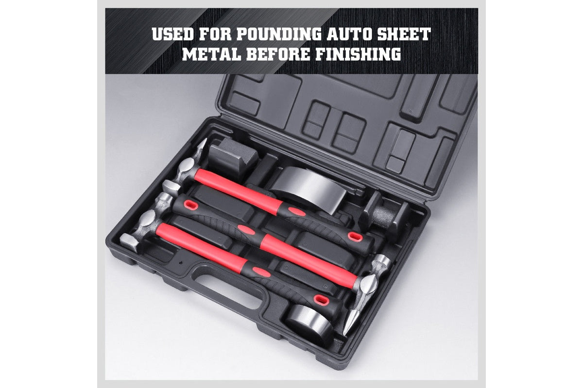 Set of seven panel beating hammers and dollies in carry case