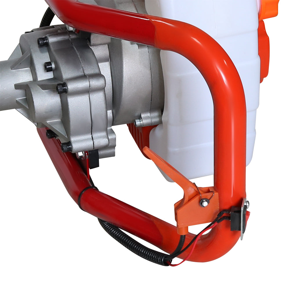 Post hole borer 58cc with 200mm drill bit attached in use