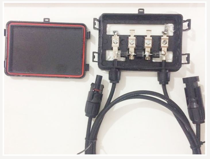 Back view of 150W solar panel showing cable and connector