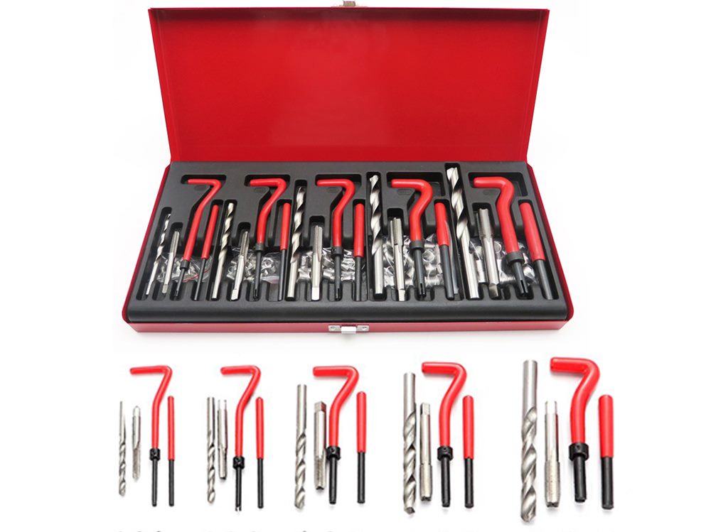 Close up of red case holding thread repair kit tools