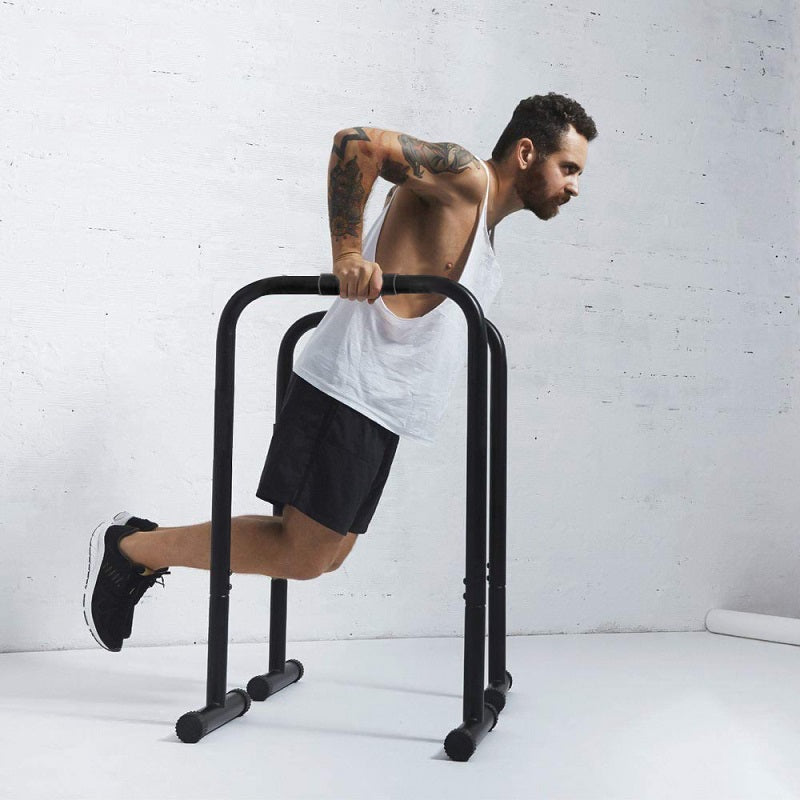 Parallel bar station dip bars demonstrating height and base width