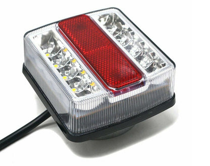 LED trailer tail lights illuminated at night on a trailer