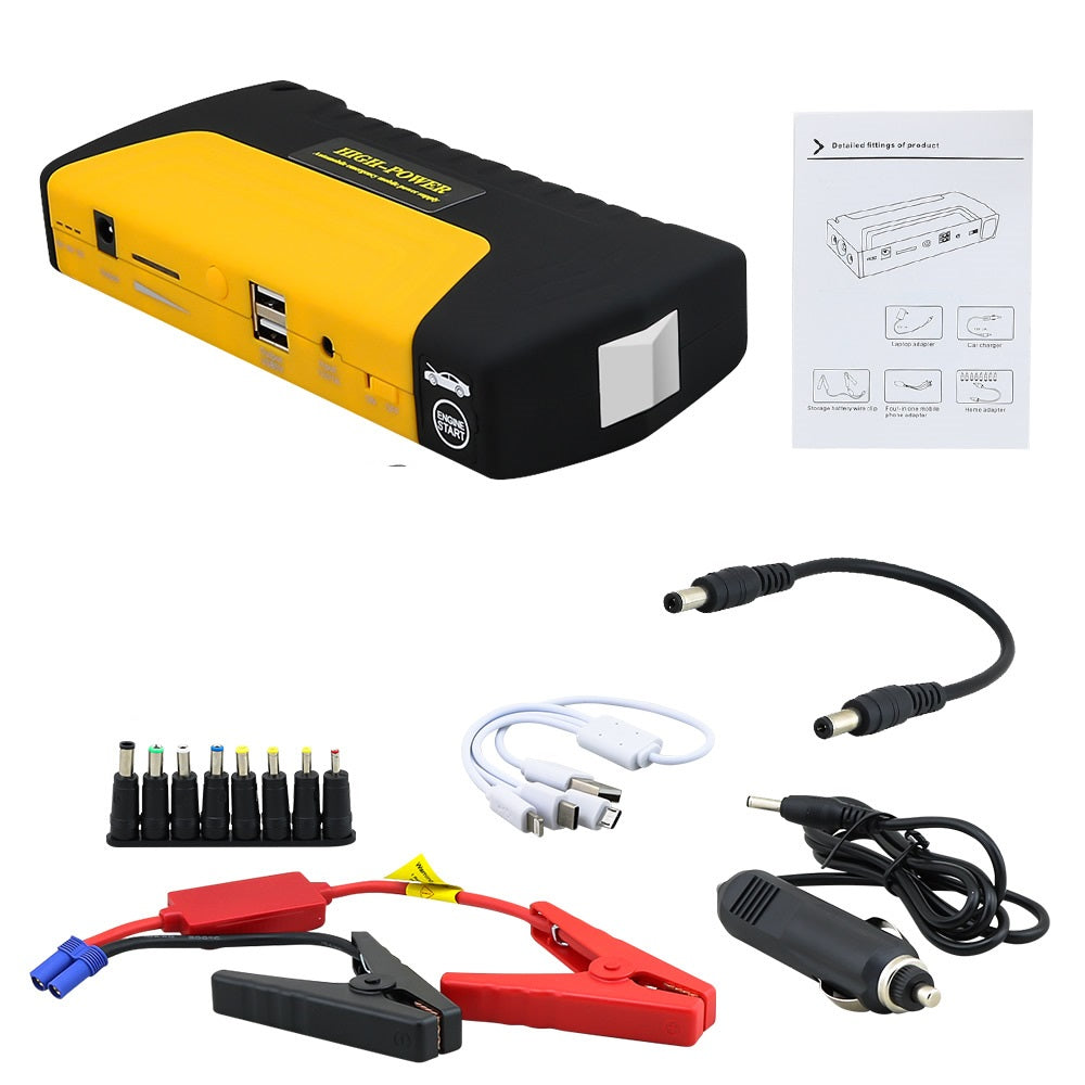 Car jump starter connected to a 12V vehicle battery in use