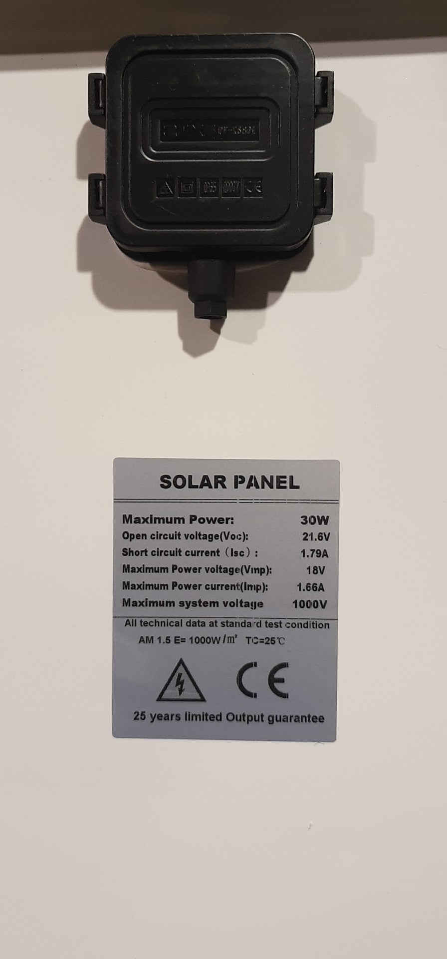 30W solar panel installed on flat surface for garden lighting