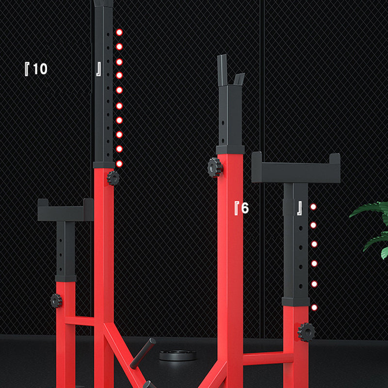 Rubber caps on squat rack protecting floor and equipment