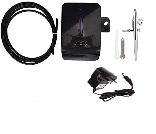 Air brush compressor with air brush holder included