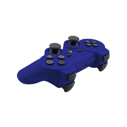 PS3 wireless controller blue resting on a wooden table