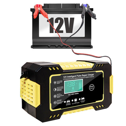 12V 6A car battery charger plugged in and charging a car battery