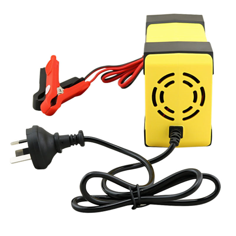 Close-up of car battery charger clamps for 12V battery